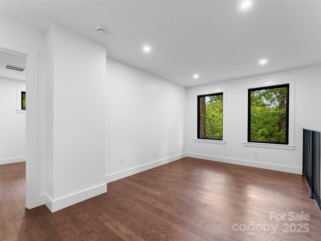 285 Poplar Crest Dr, Pisgah Forest, NC 28768 - empty room featuring wood finished floors, a smoke detector, and recessed lighting