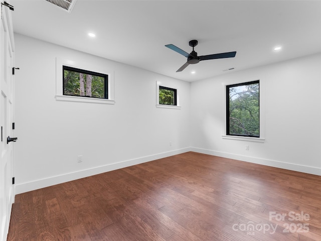285 Poplar Crest Dr, Pisgah Forest, NC 28768 - spare room featuring wood finished floors, a ceiling fan, and recessed lighting