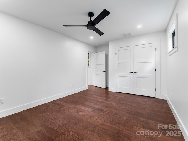 285 Poplar Crest Dr, Pisgah Forest, NC 28768 - unfurnished bedroom featuring dark wood-style flooring, a closet, recessed lighting, and ceiling fan
