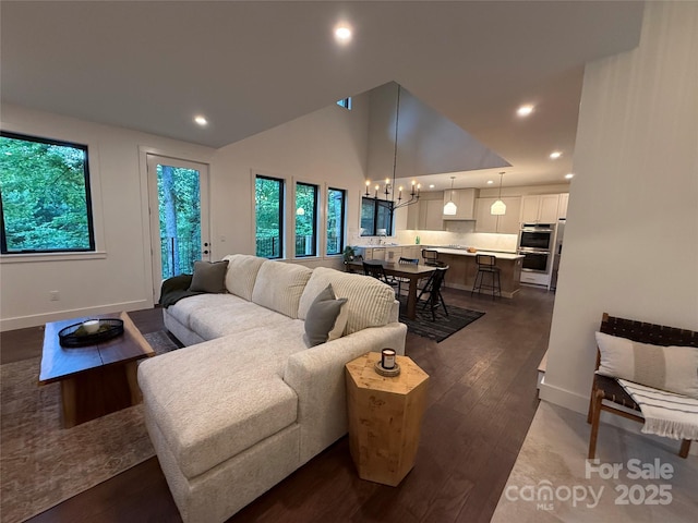 285 Poplar Crest Dr, Pisgah Forest, NC 28768 - living area featuring a chandelier, dark wood-type flooring, and recessed lighting