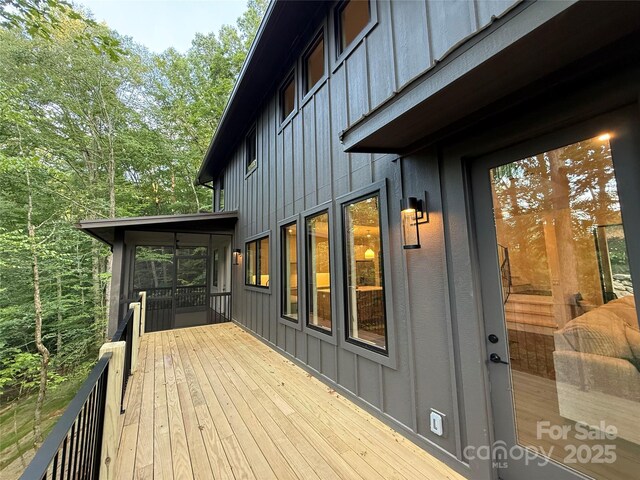 285 Poplar Crest Dr, Pisgah Forest, NC 28768 - deck with a sunroom