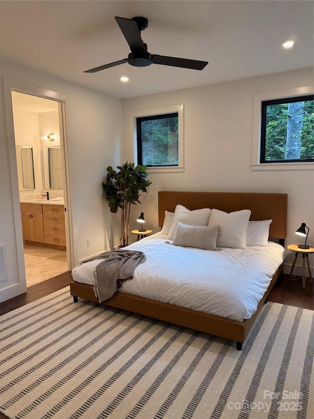 285 Poplar Crest Dr, Pisgah Forest, NC 28768 - bedroom with wood finished floors, ensuite bath, recessed lighting, and a ceiling fan