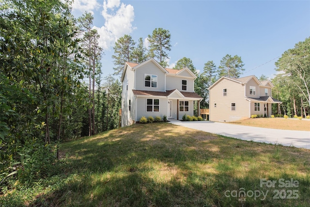 2206 Hillcrest Ave, Albemarle, NC 28001 - traditional home featuring a front yard and concrete driveway