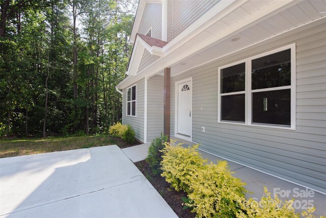 2206 Hillcrest Ave, Albemarle, NC 28001 - view of exterior entry featuring a patio