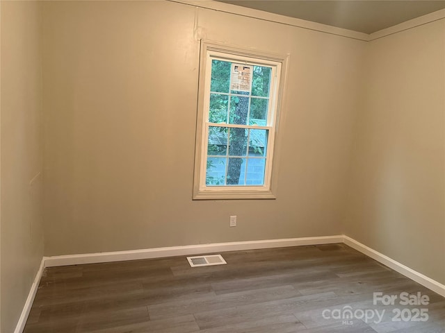 3166 Poplar Tent Rd, Concord, NC 28027 - unfurnished room with wood finished floors and baseboards