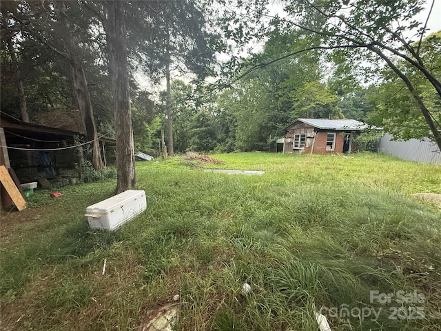 3166 Poplar Tent Rd, Concord, NC 28027 - view of yard with an outbuilding