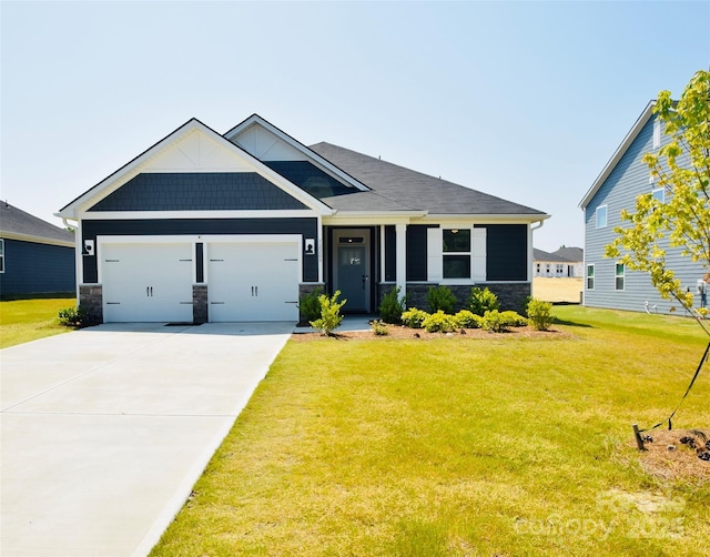 12209 Riceland Way, Midland, NC 28107 - craftsman house with stone siding, an attached garage, a front lawn, and driveway