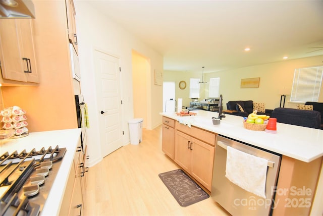 12209 Riceland Way, Midland, NC 28107 - kitchen featuring stainless steel appliances, open floor plan, light brown cabinetry, recessed lighting, and a center island with sink