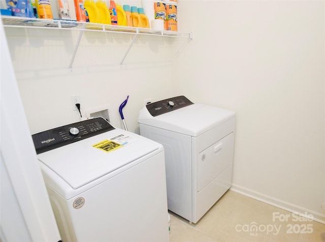 12209 Riceland Way, Midland, NC 28107 - laundry room featuring separate washer and dryer and light tile patterned flooring