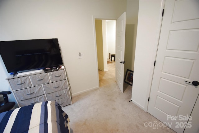12209 Riceland Way, Midland, NC 28107 - bedroom featuring light carpet and baseboards
