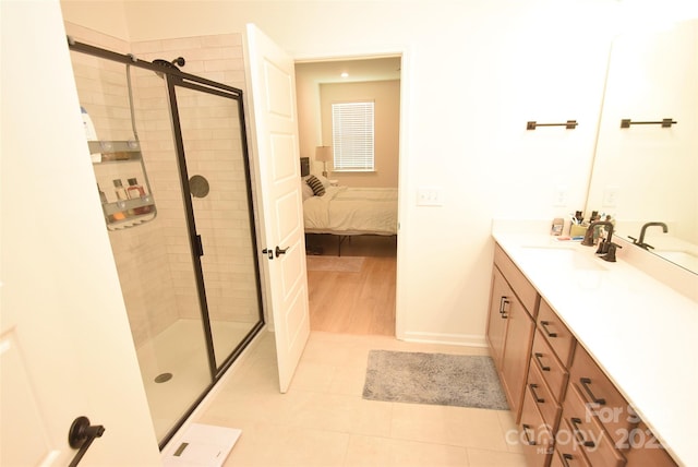12209 Riceland Way, Midland, NC 28107 - full bath with vanity, a shower stall, ensuite bathroom, and tile patterned flooring