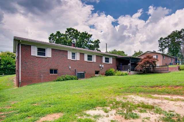 2310 Honeysuckle Pl, Lenoir, NC 28645 - rear view of house with a yard and brick siding