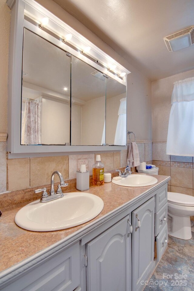 2310 Honeysuckle Pl, Lenoir, NC 28645 - full bath with double vanity and tile walls