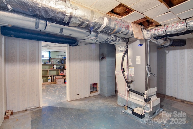 2310 Honeysuckle Pl, Lenoir, NC 28645 - basement featuring heating unit and wallpapered walls