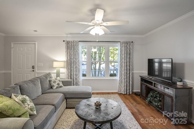 9214 Arbourgate Meadows Ln, Charlotte, NC 28277 - living area with ceiling fan, wood finished floors, and crown molding