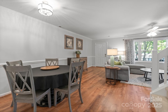 9214 Arbourgate Meadows Ln, Charlotte, NC 28277 - dining room with ornamental molding, wood finished floors, and a ceiling fan