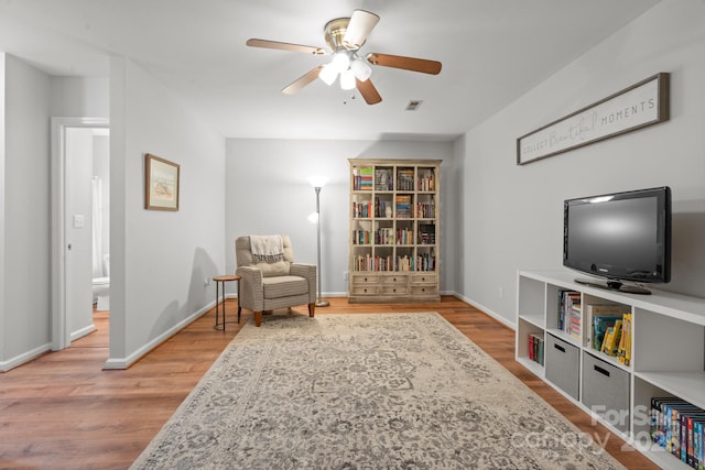 9214 Arbourgate Meadows Ln, Charlotte, NC 28277 - living area featuring wood finished floors and ceiling fan