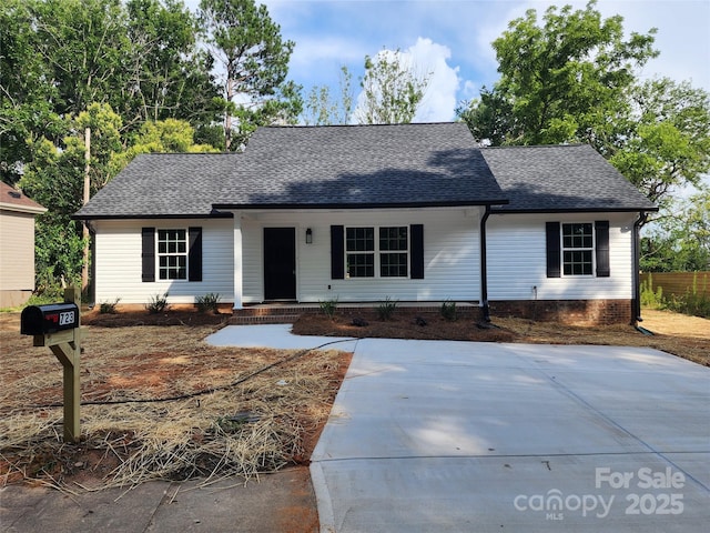 723 Taylor St, Rock Hill, SC 29730 - ranch-style house featuring a shingled roof and covered porch