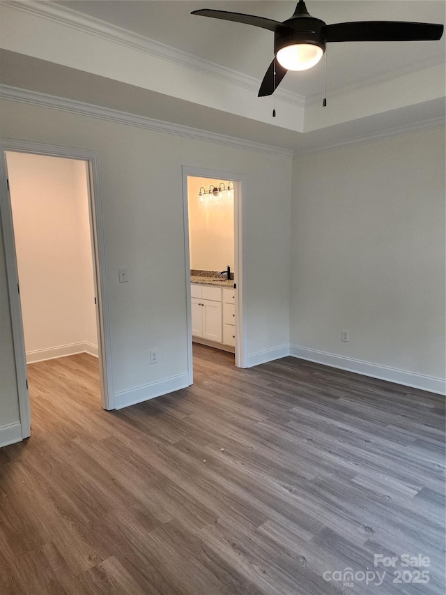 723 Taylor St, Rock Hill, SC 29730 - unfurnished bedroom featuring ornamental molding, wood finished floors, ensuite bath, and ceiling fan