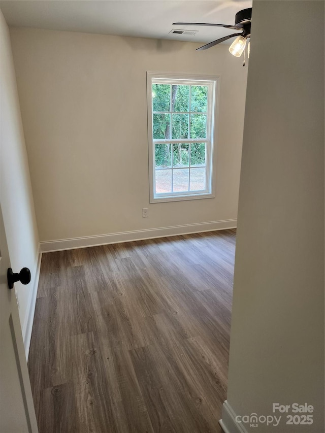 723 Taylor St, Rock Hill, SC 29730 - spare room with dark wood-style flooring and a ceiling fan