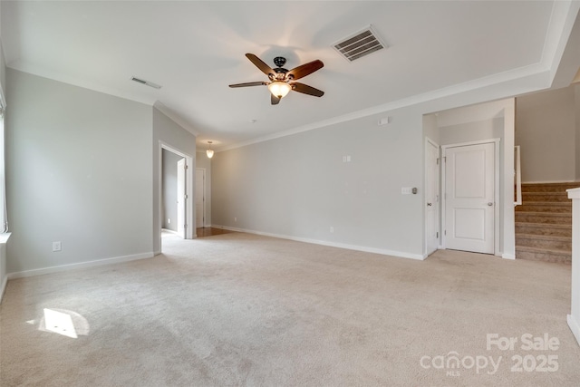 365 Battery Cir, Clover, SC 29710 - empty room featuring ceiling fan, light colored carpet, stairway, and ornamental molding