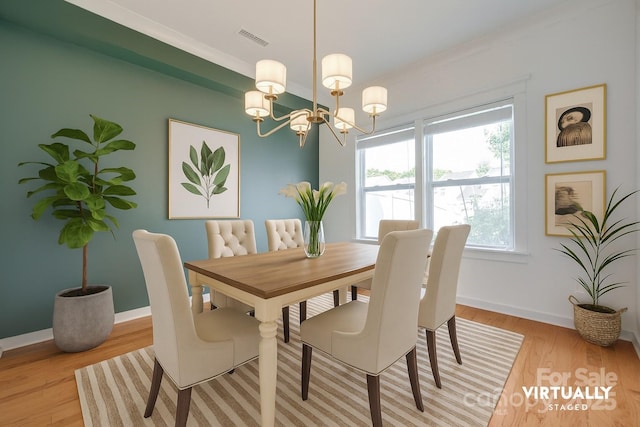 365 Battery Cir, Clover, SC 29710 - dining room featuring a chandelier, light wood-style floors, and ornamental molding