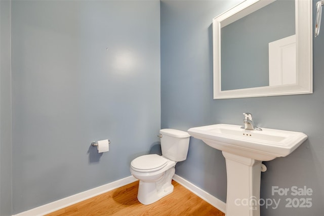 365 Battery Cir, Clover, SC 29710 - half bathroom featuring toilet and wood finished floors