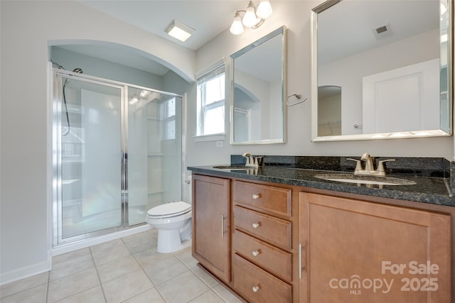 365 Battery Cir, Clover, SC 29710 - bathroom with a stall shower, double vanity, and tile patterned flooring