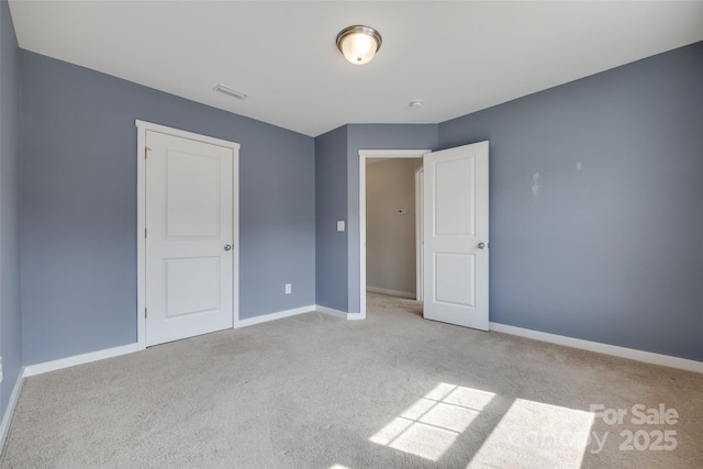 365 Battery Cir, Clover, SC 29710 - unfurnished bedroom featuring light carpet and baseboards