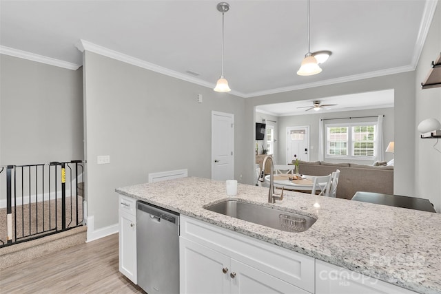 2662 14th St NE, Hickory, NC 28601 - kitchen with dishwasher, a ceiling fan, light wood-style floors, crown molding, and white cabinetry