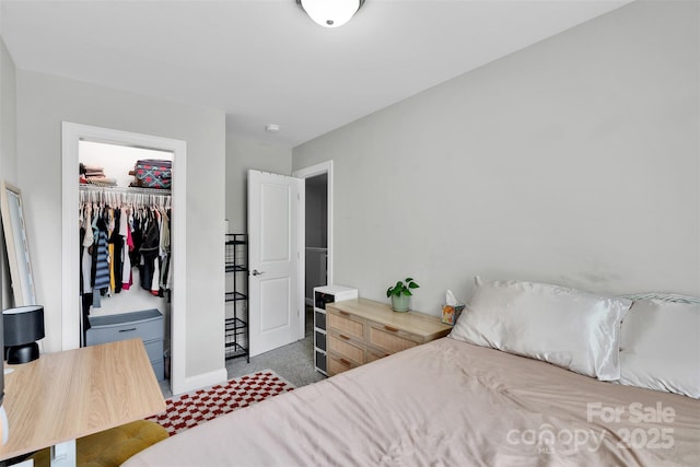2662 14th St NE, Hickory, NC 28601 - bedroom featuring a closet and a walk in closet