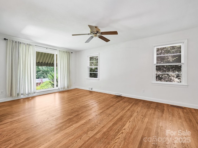 123 Blake Dr, Arden, NC 28704 - empty room featuring a ceiling fan and light wood-style floors