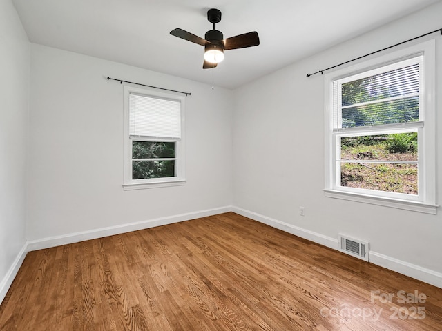 123 Blake Dr, Arden, NC 28704 - unfurnished room with wood finished floors and ceiling fan