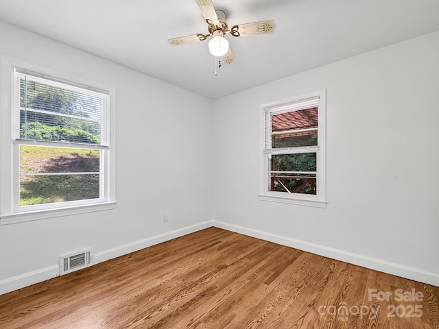 123 Blake Dr, Arden, NC 28704 - unfurnished room featuring wood finished floors and a ceiling fan