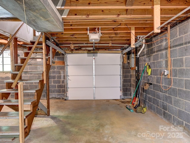 123 Blake Dr, Arden, NC 28704 - garage featuring concrete block wall and a garage door opener
