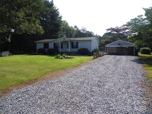 1475 Ferguson Dr, Clemmons, NC 27012 - ranch-style house with gravel driveway, a detached carport, and a front yard