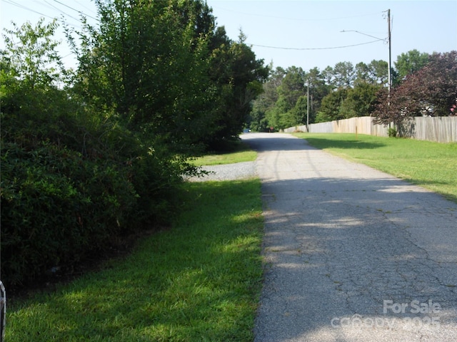 1475 Ferguson Dr, Clemmons, NC 27012 - view of asphalt road featuring street lights