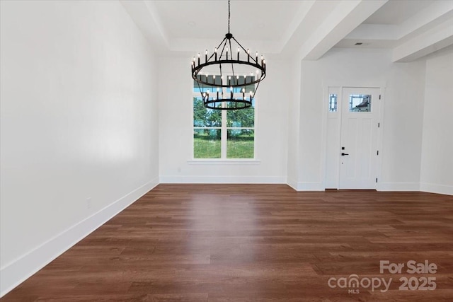 108 Augusta Ln, Shelby, NC 28150 - entryway featuring a raised ceiling, a chandelier, and dark wood-type flooring