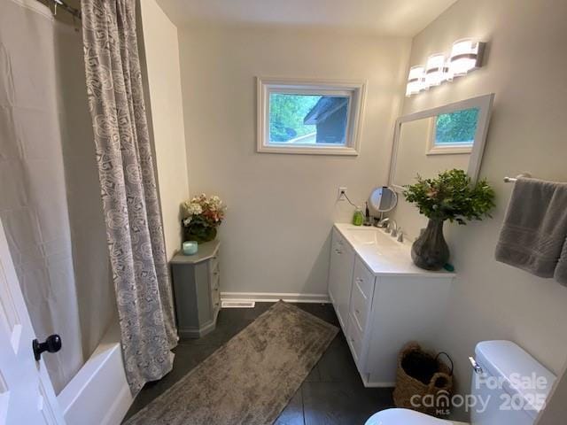 9800 Feldbank Dr, Charlotte, NC 28216 - bathroom featuring vanity and shower / bath combo with shower curtain