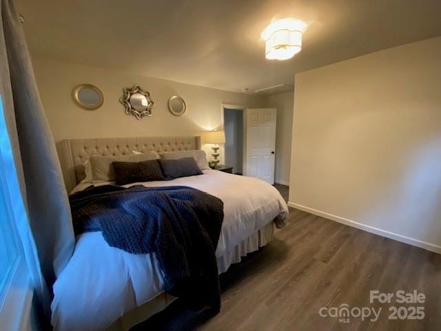 9800 Feldbank Dr, Charlotte, NC 28216 - bedroom featuring dark wood finished floors and baseboards