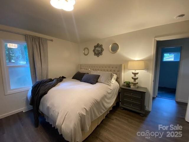 9800 Feldbank Dr, Charlotte, NC 28216 - bedroom featuring wood finished floors and vaulted ceiling