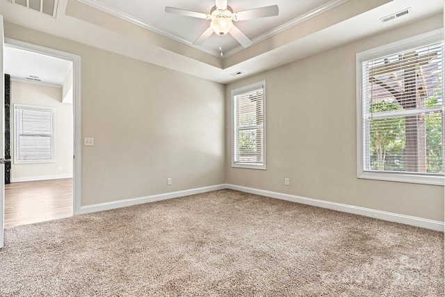 7315 Surprise Ct, Charlotte, NC 28215 - spare room with crown molding, carpet floors, and ceiling fan