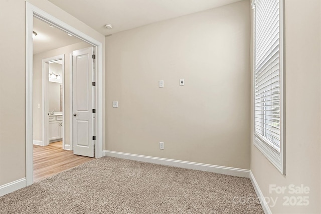 7315 Surprise Ct, Charlotte, NC 28215 - unfurnished room with light colored carpet and a smoke detector