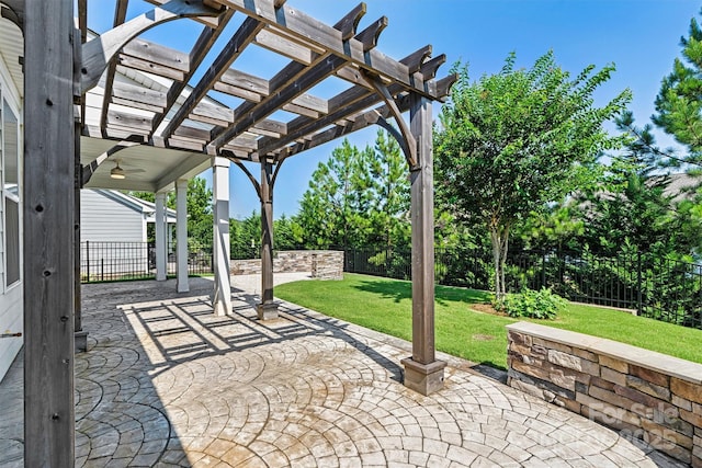 7315 Surprise Ct, Charlotte, NC 28215 - fenced backyard with a patio, a pergola, and ceiling fan
