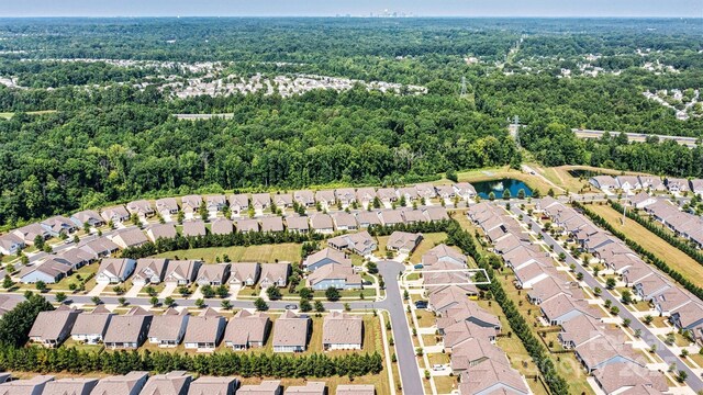 7315 Surprise Ct, Charlotte, NC 28215 - aerial view of property's location featuring nearby suburban area and a forest