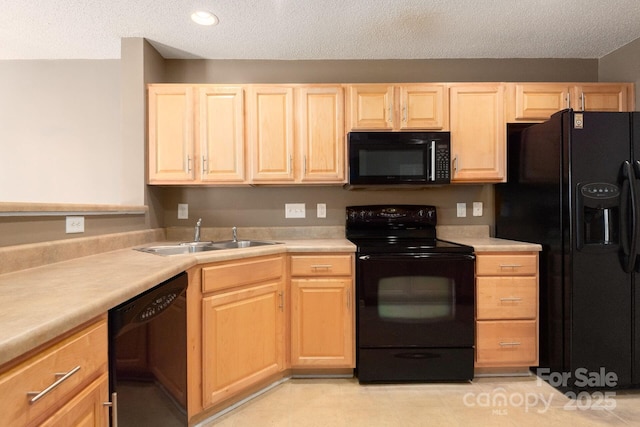 10613 Prairie Ridge Ln, Charlotte, NC 28213 - kitchen featuring black appliances, light brown cabinets, a textured ceiling, light countertops, and recessed lighting