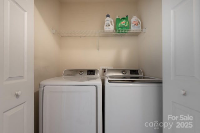 10613 Prairie Ridge Ln, Charlotte, NC 28213 - laundry room with washing machine and clothes dryer
