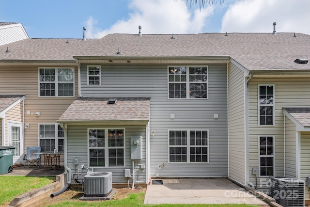 10613 Prairie Ridge Ln, Charlotte, NC 28213 - rear view of house featuring a patio area and roof with shingles