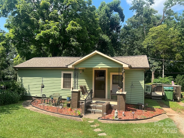 302 Margarette Ave, Belmont, NC 28012 - view of front of property with a front lawn, a porch, and a shingled roof