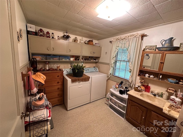 302 Margarette Ave, Belmont, NC 28012 - laundry area featuring independent washer and dryer, cabinet space, and ornamental molding
